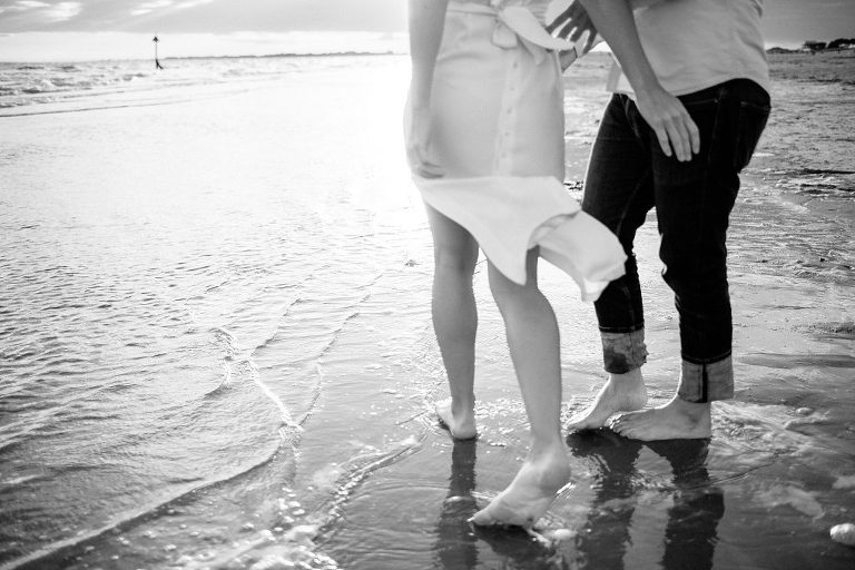 Couple shot by the sea- Natural wedding photographer UK
